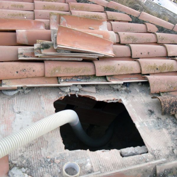 Proceso de aislamiento térmico de cubierta por exterior
